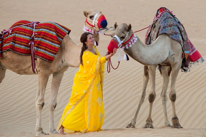 High Red Dunes with Camel Ride, Sandboarding, Falcon Show and VIP BBQ Dinner - Dance shows, entertainment, and the camp energy