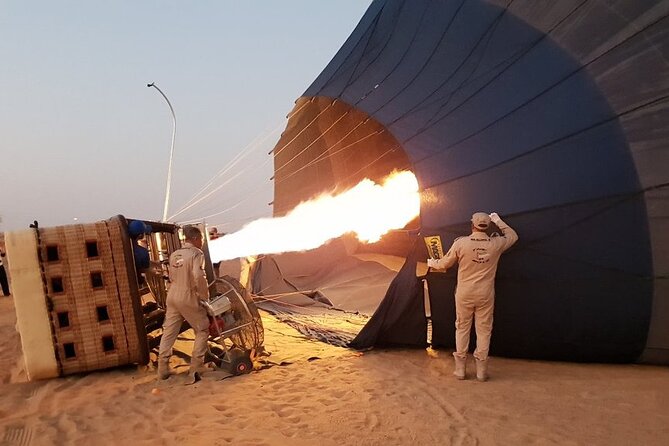 Hot Air Balloon Ride With Gourmet Breakfast & Falcon Show - What to pack for a cold start, then a warm sunrise