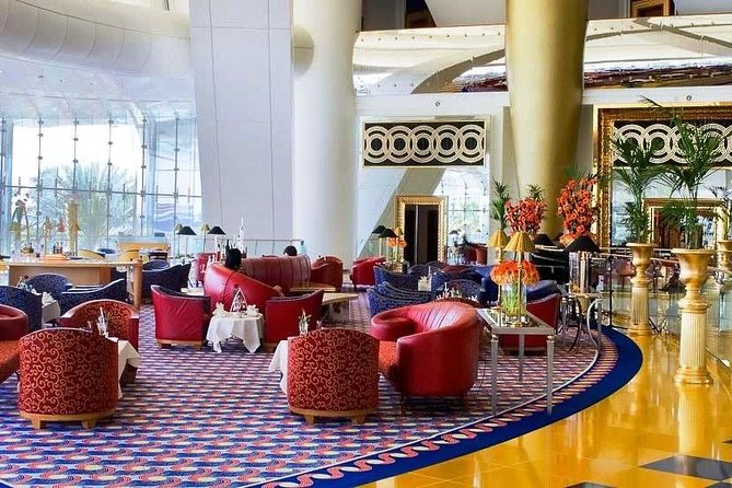 Inside Burj Al Arab Guided Tour with Transfer & Dinner Options - Getting There: One-way Private Pickup and the Buggy Island Crossing