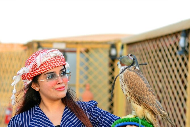 Morning Desert Safari From Abu Dhabi - Desert Rose Camp Time: Camel Riding, Sand Boarding, and Falcon Photos