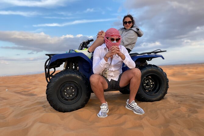 Morning Desert Safari, Quad Bike, Sandboard and Camel Ride - Dune bashing and sandboarding: adrenaline with a quick photo rhythm