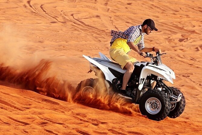 Morning Desert Safari with Camel Ride and Quad Bike - Free sandboarding and the switch to slower, calmer moments