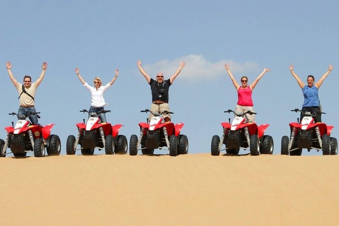 Morning Desert Safari With Quad Bike - Sandboarding: the activity that makes photos look effortless