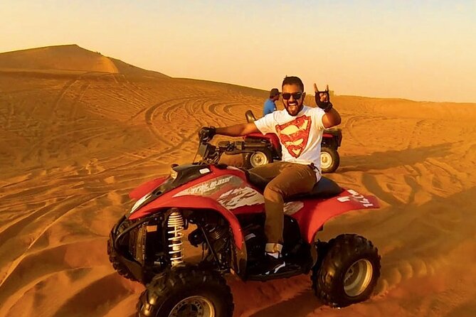 Morning Desert Safari with Quad Bike, Camel Ride & Sandboarding - Best Fit for First-Timers, Families, and Thrill Seekers