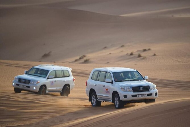 Morning Desert Safari with Quad Biking - From pickup to Lahbab: dune bashing in a 4x4 and instant red-sand vibes