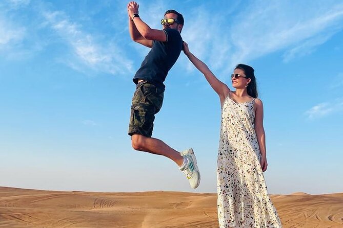 Morning Desert Safari with Sandboarding & Camel Ride on Red Dunes - Quad biking and sandboarding, how to choose your thrill level