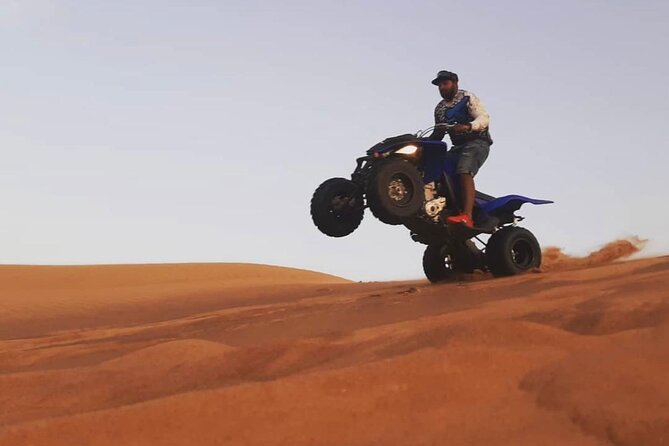 Morning Quad Biking & Red Sand Desert Safari , Camel Ride, Sand Boarding - Camel ride and sandboarding: the traditional plus the playful