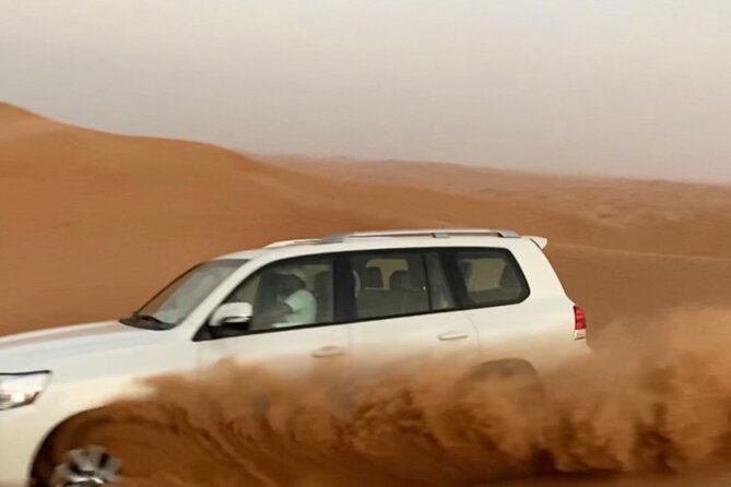 Morning Red Dune Safari with Sandboarding and Camel Ride - 4-wheel-drive dune bashing: the thrill, the rhythm, and what to expect