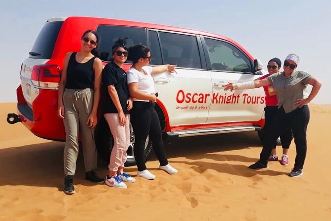 Morning Red Dunes with Camel Ride, Sandboarding and Refreshments - From Dubai pickup to red-sand dune bashing in a Land Cruiser