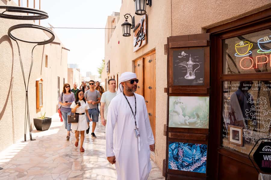 Old Dubai Historic Guided Tour: Creek, Street Food & Souks - Coffee, dates, and a heritage house tour that explains the past without boredom