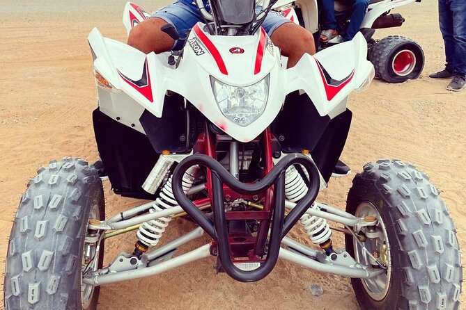 One hour Quad Bike at Red Sand Desert Safari with Camel Ride and BBQ Dinner - Key points before you go