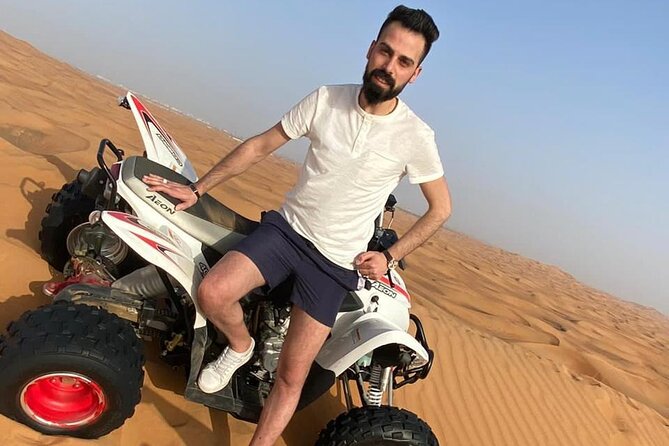 One hour Quad Bike at Red Sand Desert Safari with Camel Ride and BBQ Dinner - A One-Day Mashup: Dubai Pickup, Red Sands, and a Full Evening