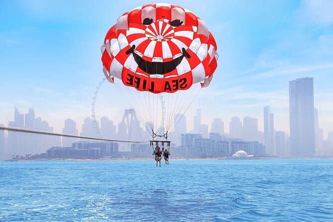 Parasailing in Dubai with Palm Jumeirah and JBR Beach views - Sea Life WaterSports Dubai: Meeting Point, Dock Details, and Facilities