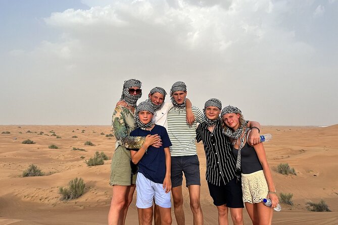 Premium Desert Safari Activities for Group and Family - Sandboarding, camel rides, and henna: the camp activities that make it family-friendly