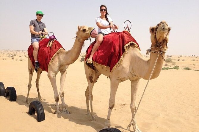 Premium Desert Safari Dubai: Desert Camping & Dune Bashing - Camel Riding and Henna: simple activities that add real texture