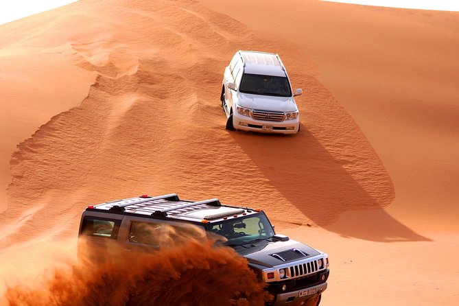 Premium Desert Safari Dubai: Desert Camping & Dune Bashing - Sand Boarding and Photos: what’s included versus not always guaranteed