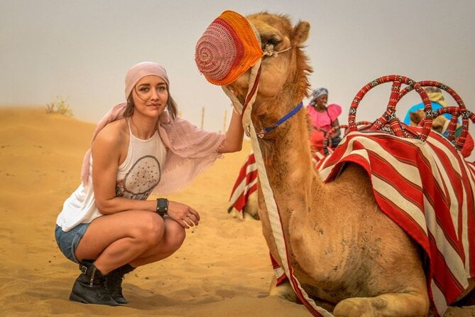 Premium Desert Safari Dubai with Camel Riding and BBQ Dinner - Bedouin camp time: henna, shisha, and live entertainment