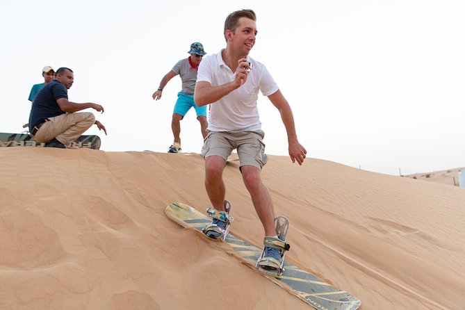 Premium Dubai Desert Safari with BBQ Dinner in the Red Dunes - Dune bashing and sandboarding: the adrenaline, plus the safety basics