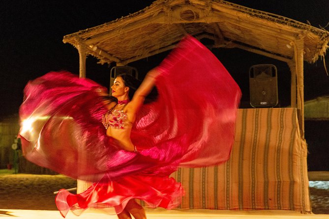 Premium Dubai Desert Safari with BBQ Dinner in the Red Dunes - The camp at sunset: henna, tanoura, shisha, and fire show