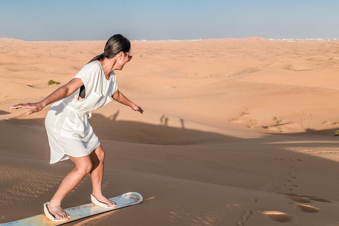 Premium Dubai Desert Safari with Dune Bashing, BBQ, Live Shows - Live shows: belly dance, Tanoura, and a fire performance