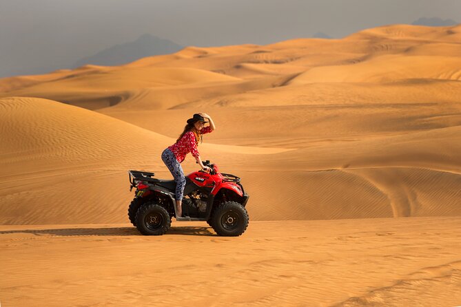 Premium Dubai Red Dunes with quadbike, camel ride and VIP Dinner - Self-drive quad biking: the most fun you’ll control