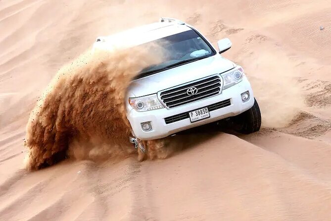 Premium Evening Desert Safari, Quad Bike, Camel & VIP BBQ Dinner - The red dunes of Lahbab, and why evening works