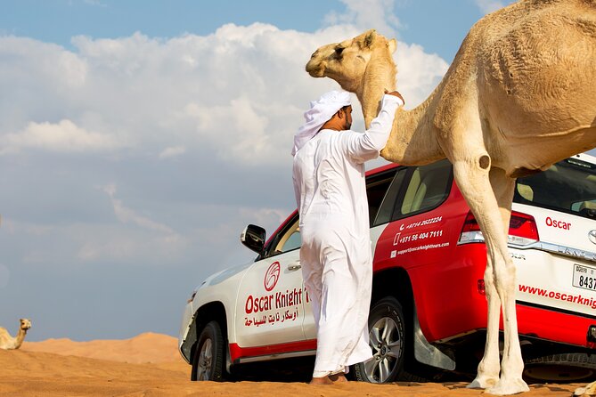 Premium Morning Red Dunes with Quad Bike - Getting to the desert: land cruiser pickup and a capped group