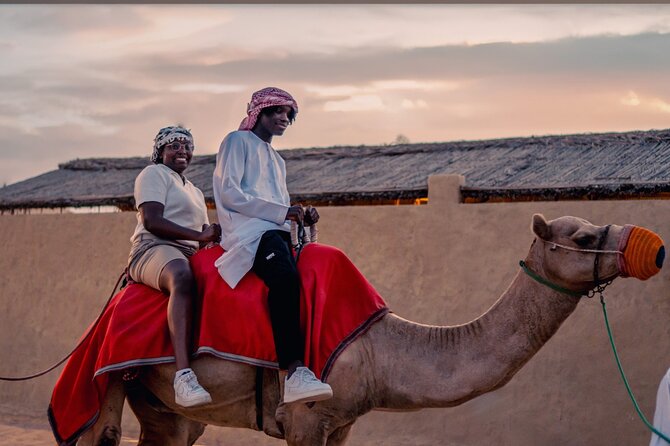 Premium Red Dune Safari with Camel Ride and BBQ in Arabian camp - Unlimited live BBQ buffet with belly dance, tanoura, and fire shows