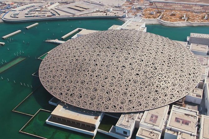 Private Abu Dhabi City Tour with Louvre Museum & Sheikh Zayed Grand Mosque - Corniche and Dates Market: the easy win for local color