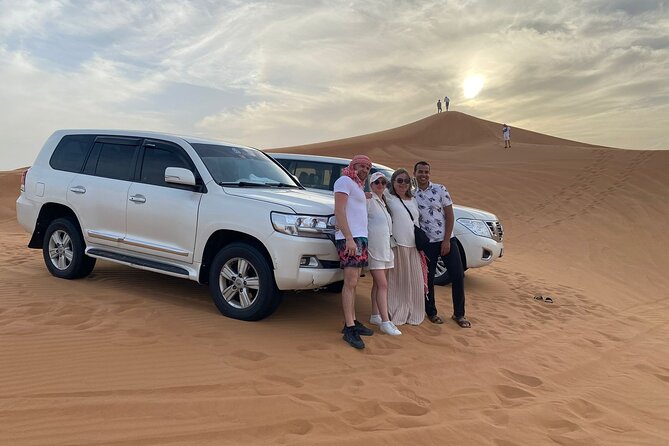 Private Desert Safari Dubai Tour With Dune Bashing and BBQ Dinner - Arabian Nights on Stage: Gahwa Welcome, Belly Dance Shows, Tanoura, and Fire Show