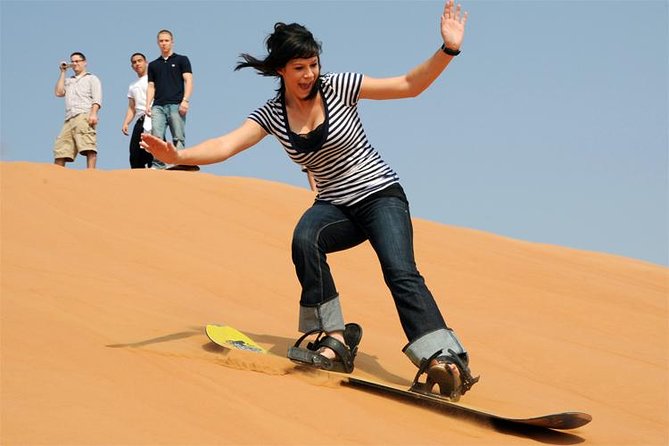 Private Desert Safari Red Dunes with BBQ,Camel Ride,Sand Boarding,Live Shows - Henna Tattoo and the Sunset Timing