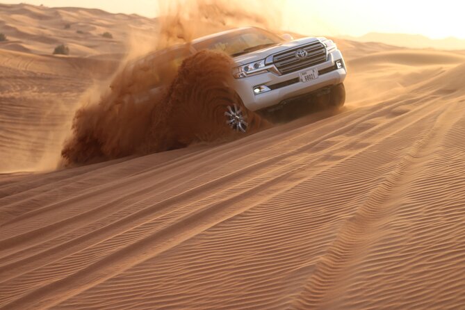 Private Evening Desert Safari Dubai with Camel Riding & BBQ - Lahbab red sands dune bashing, plus the sunset photo window