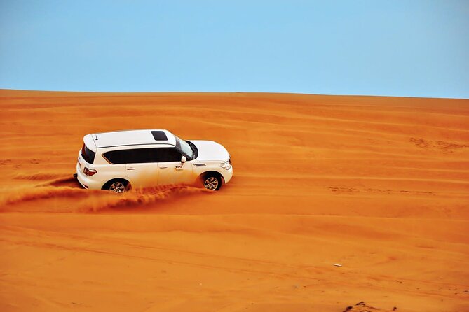 Private Evening Desert Safari: Sandboarding Camel Ride BBQ Dinner - Premium Desert Camp in Al Awir: Arabian welcome and hands-on culture