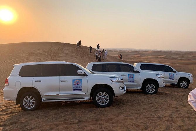 Private Evening Desert Safari with BBQ Dinner & Sand Boarding - Camel Ride, Falcon Photo, and Optional Quad or Dune Buggy Add-Ons