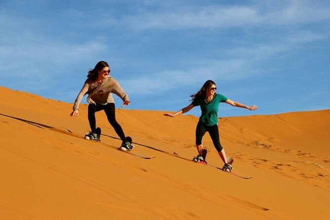 Private Evening Red Sand Desert Safari with BBQ Dinner - BBQ Buffet Dinner, Belly Dance, Tanura, and a Fire Show