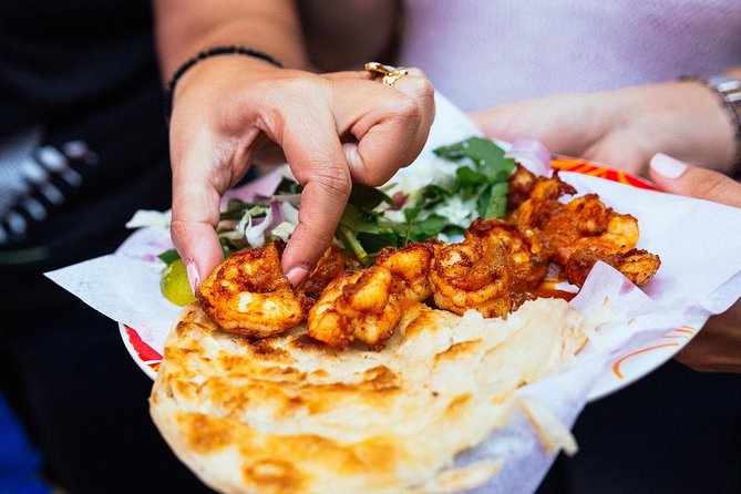 PRIVATE Food Tour: The 10 Tastings of Dubai With Locals - Stop 1: Dubai Spice Souk, falafel, and camel milk dates