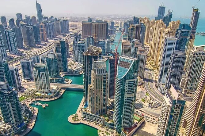 Private Full Day Dubai City Tour - Abra ride across the creek: the simplest old Dubai moment
