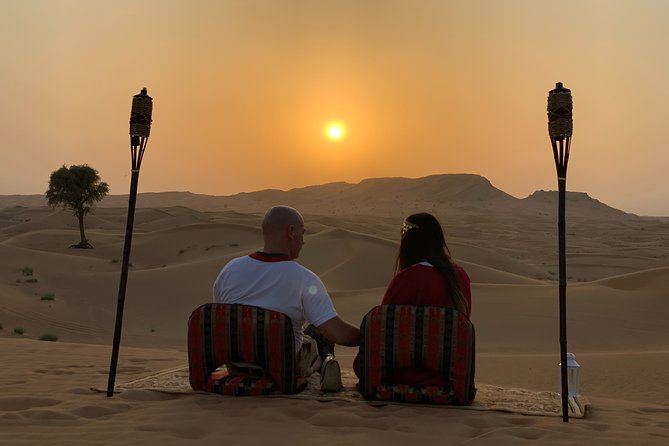 Private Red Dunes Desert Safari , BBQ Dinner and Camel ride - Live Entertainment Package: Tanoura, Fire Show, and Belly Dance Timing