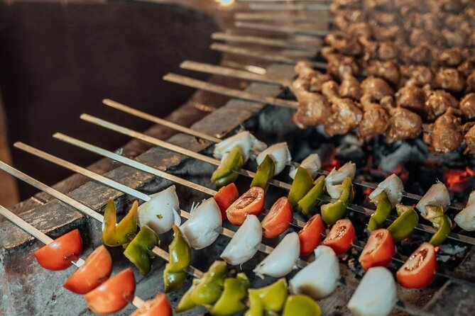 Private Sunset Desert Safari:SandSurfing, Camel Ride & BBQ dinner - Sandboarding: the easy way to feel like you own the dunes