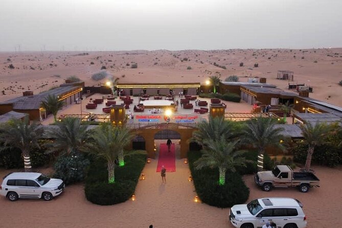 Private Sunset Desert Safari:SandSurfing, Camel Ride & BBQ dinner - Entering the Deluxe-rated camp: coffee, sweets, henna, and shisha