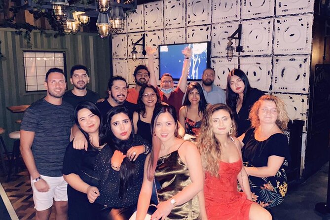 Pub Crawl Dubai: Nightlife Tours - Stop 1 in Downtown: rooftop warm-up and first-shot momentum