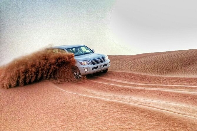 RAK Desert Safari and BBQ Dinner with RAK pick up - Sandboarding and Camel Ride: Included, But Know What to Expect