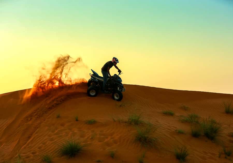Ras Al Khaimah: Guided Quad Bike Tour - The quad biking portion, convoy riding, and photo stops