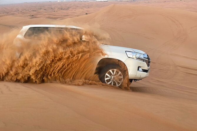 Red Dune 4x4 Desert Safari with Sand Boarding & Camel (4 hr) - The sandboarding stop in the middle of the desert