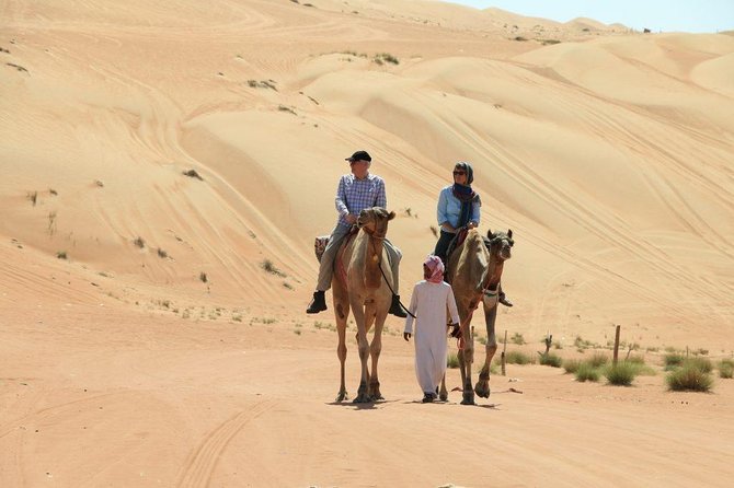 Red Dune Desert Safari with BBQ Dinner, Sand Boarding Dance Shows - First pickup, then straight to Red Dune action