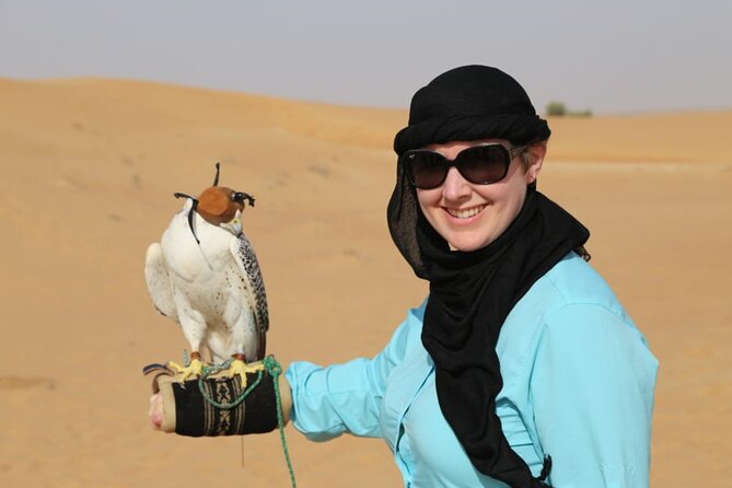 Red Dune Desert Safari with Dinner Quad Bike and Camel Ride - Dinner plus live shows: belly dancing, Tanura, fire, and lights