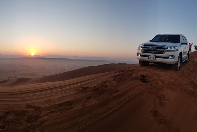 Red Dune Evening Desert Safari with Sandbashing and BBQ Dinner - Sunset photo ops and the shift into camp mode