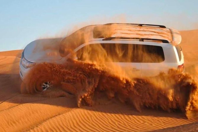 Red Dunes Desert Safari, Sand Board, Camel Ride with BBQ Dinner - 4x4 dune bashing: what to expect and how to enjoy it safely