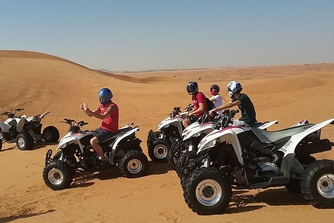 Red Dunes Lahbab Safari with BBQ Dinner and Quad Bike - Desert Camp Highlights: Camel Ride, Falcon Photo, Henna, and Arabic Dress