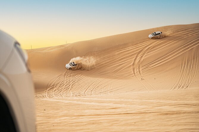 Romantic Private Dune Dinner Abu Dhabi - Sunset seating with Arabic coffee and a built-in photo window